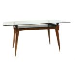 A teak and ebonised table,