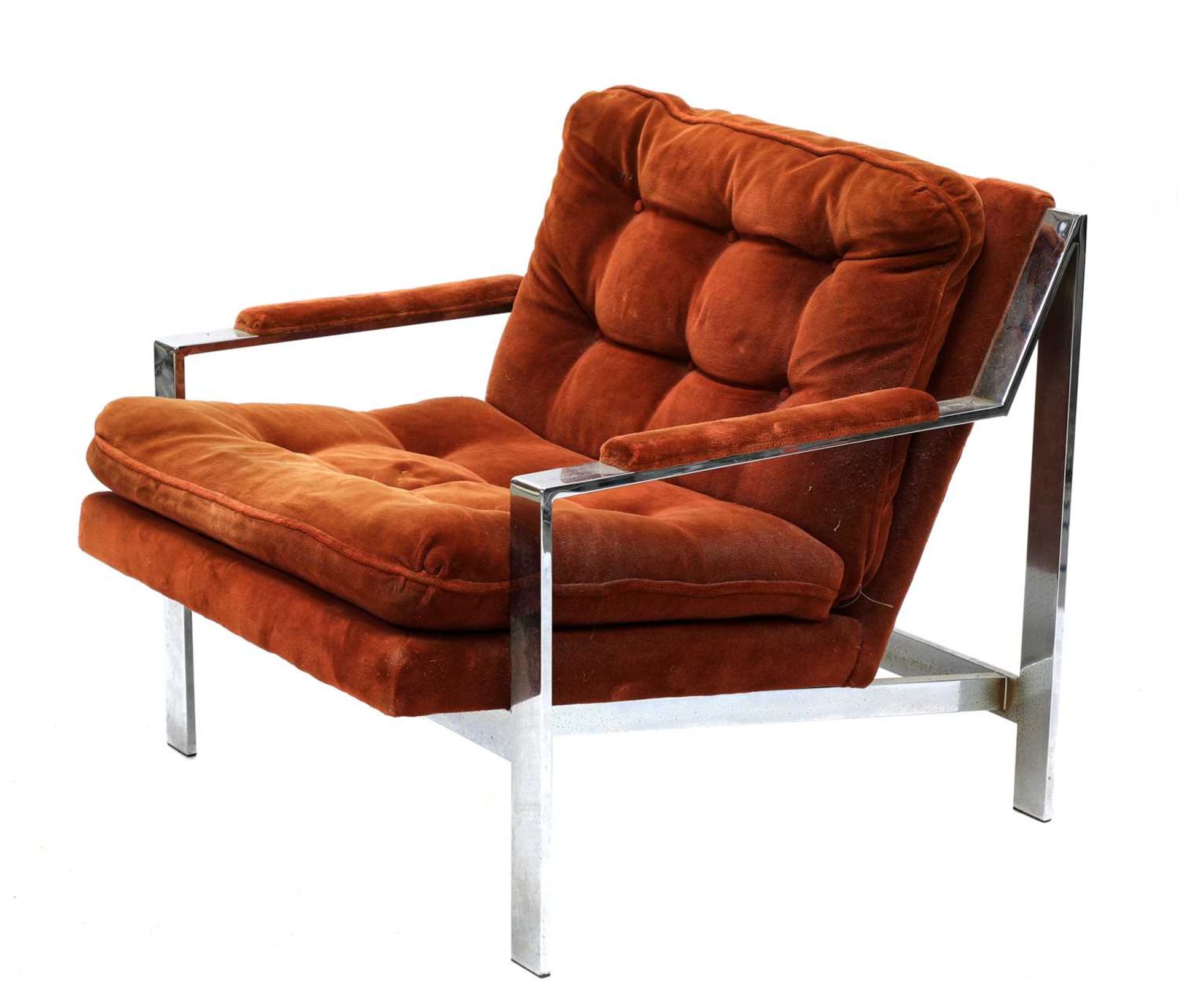 A chrome and ginger upholstered armchair,