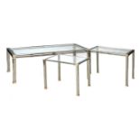 A French brass and steel nest of tables,
