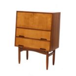 A teak and maple bureau,