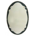 A large Italian oval wall mirror,