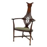 An Art Nouveau mahogany inlaid armchair,