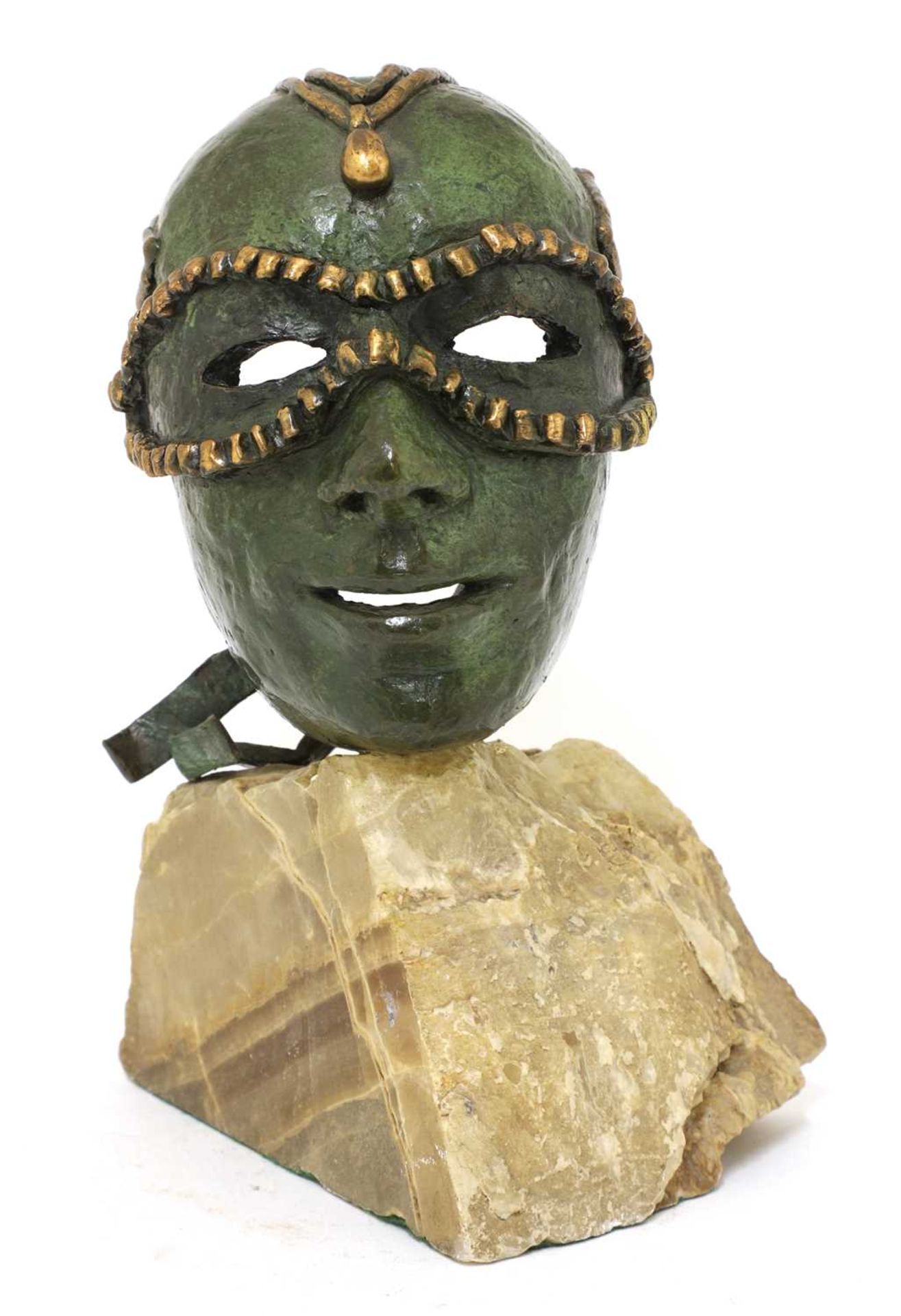 A contemporary bronze of a masked head,