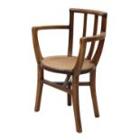 An Arts and Crafts oak armchair,