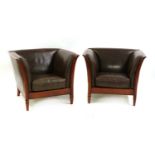 A pair of Italian chocolate leather armchairs,