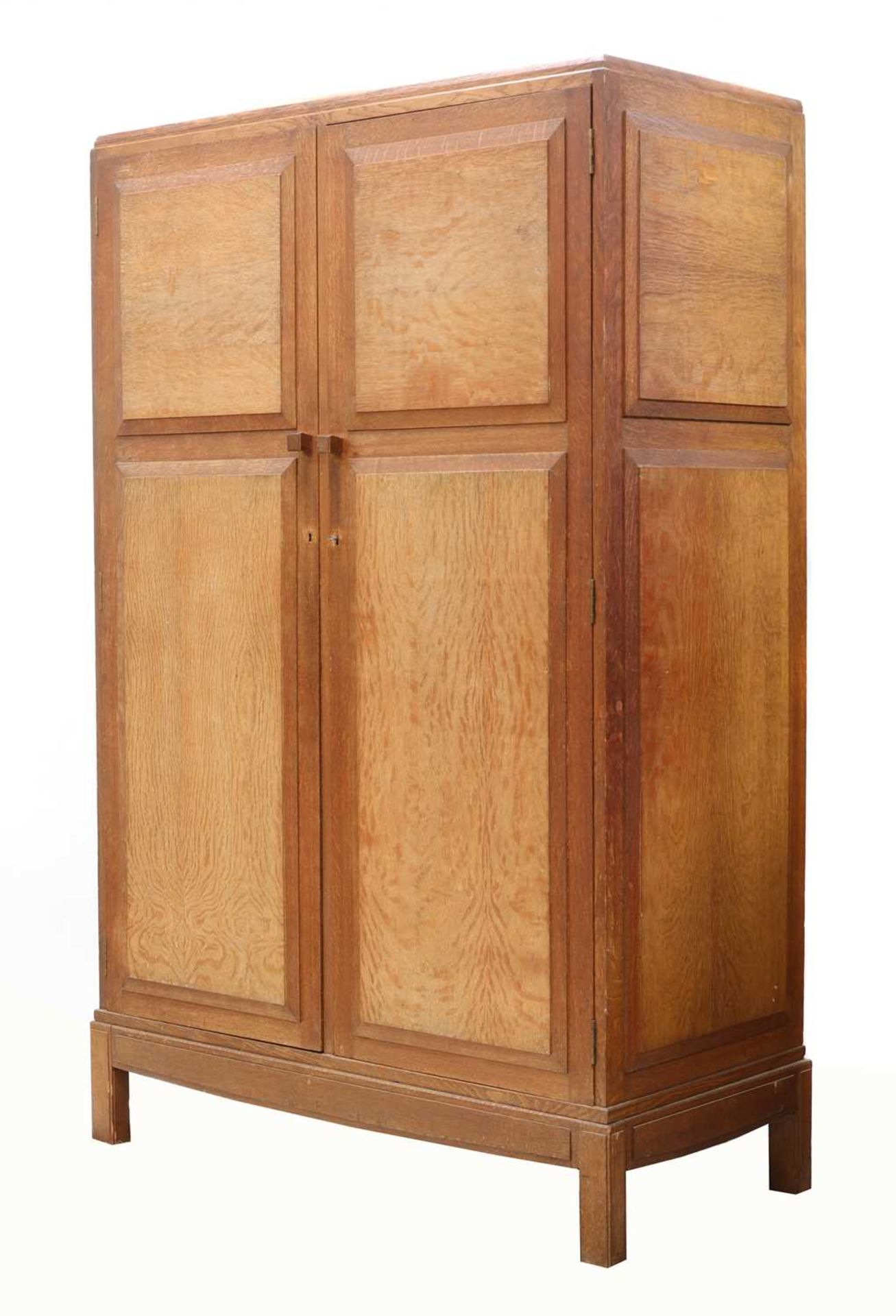 An Arts and Crafts oak wardrobe,