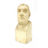 A plaster bust of a man,