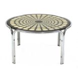 A circular chrome table,