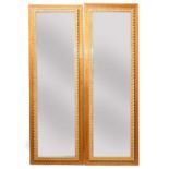 A pair of Italian walnut mirrors,