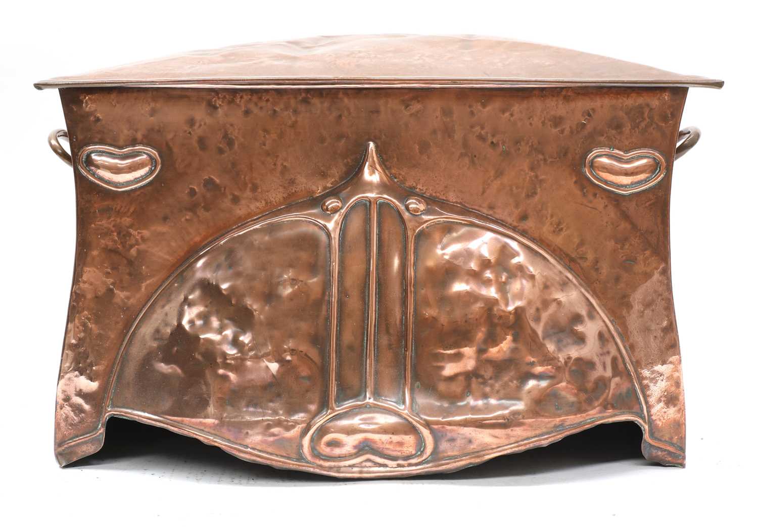 An Arts and Crafts embossed copper coal scuttle,