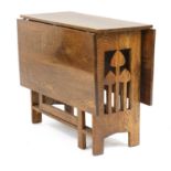 An Arts and Crafts oak gateleg table,