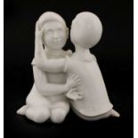 A Berlin porcelain figure of two children,