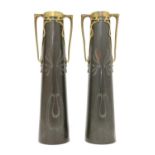 A pair of secessionist copper twin-handled vases,