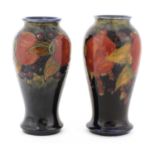 Two William Moorcroft 'Pomegranate' vases,