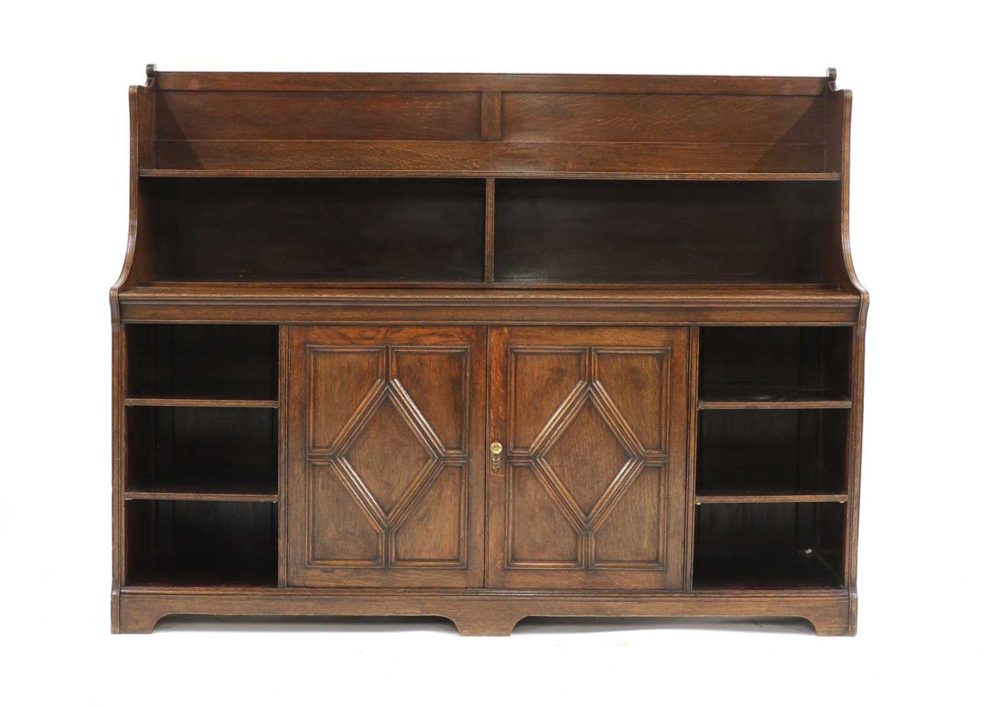 An Arts and Crafts oak bookcase,