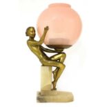 An Art Deco gilt metal figural table lamp,