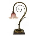 A brass table lamp,