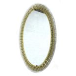 An Italian oval wall mirror,