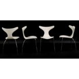 A set of four Dan-Form 'Dolphin' chairs,
