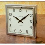 An Art Deco-style chrome-plated wall clock,
