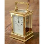 A brass carriage clock,