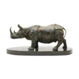 A bronze model of a rhinoceros,
