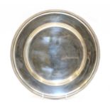 A circular silver tray by Mappin and Webb