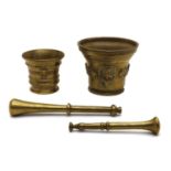 Two brass mortars,