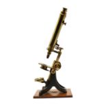 A Victorian lacquered brass binocular microscope,