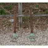 A pair of painted cast iron and ash tennis net posts,