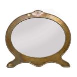 An oval silver easel dressing mirror,