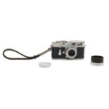 A Leica M3 camera,