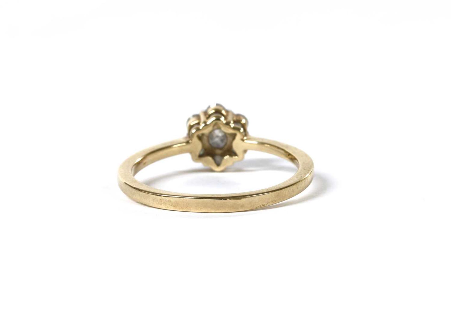 A gold diamond daisy cluster ring, - Image 3 of 3