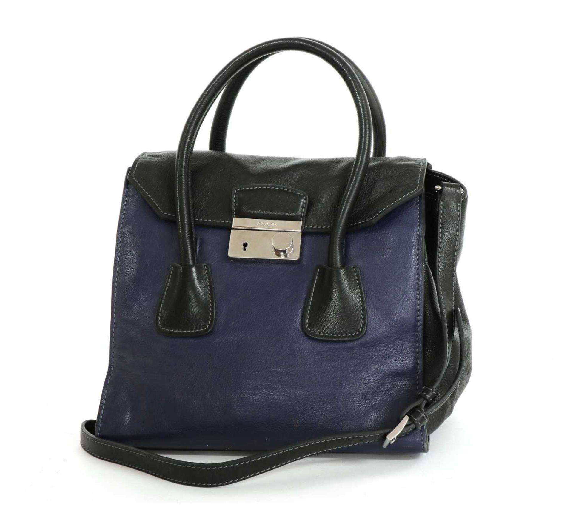 A Prada blue and black leather flap bag