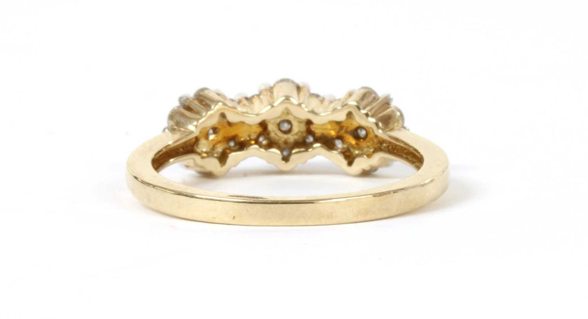 A gold diamond cluster ring. - Image 2 of 3