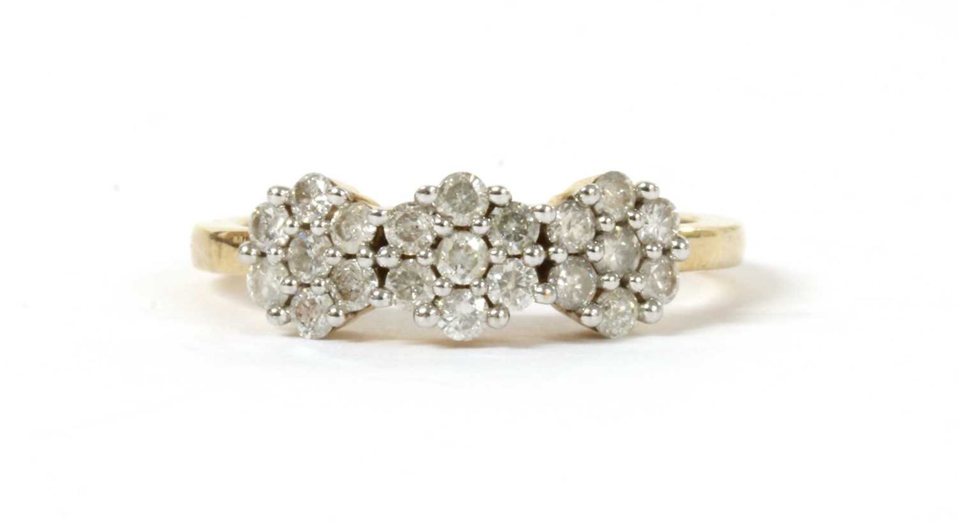 A gold diamond cluster ring.