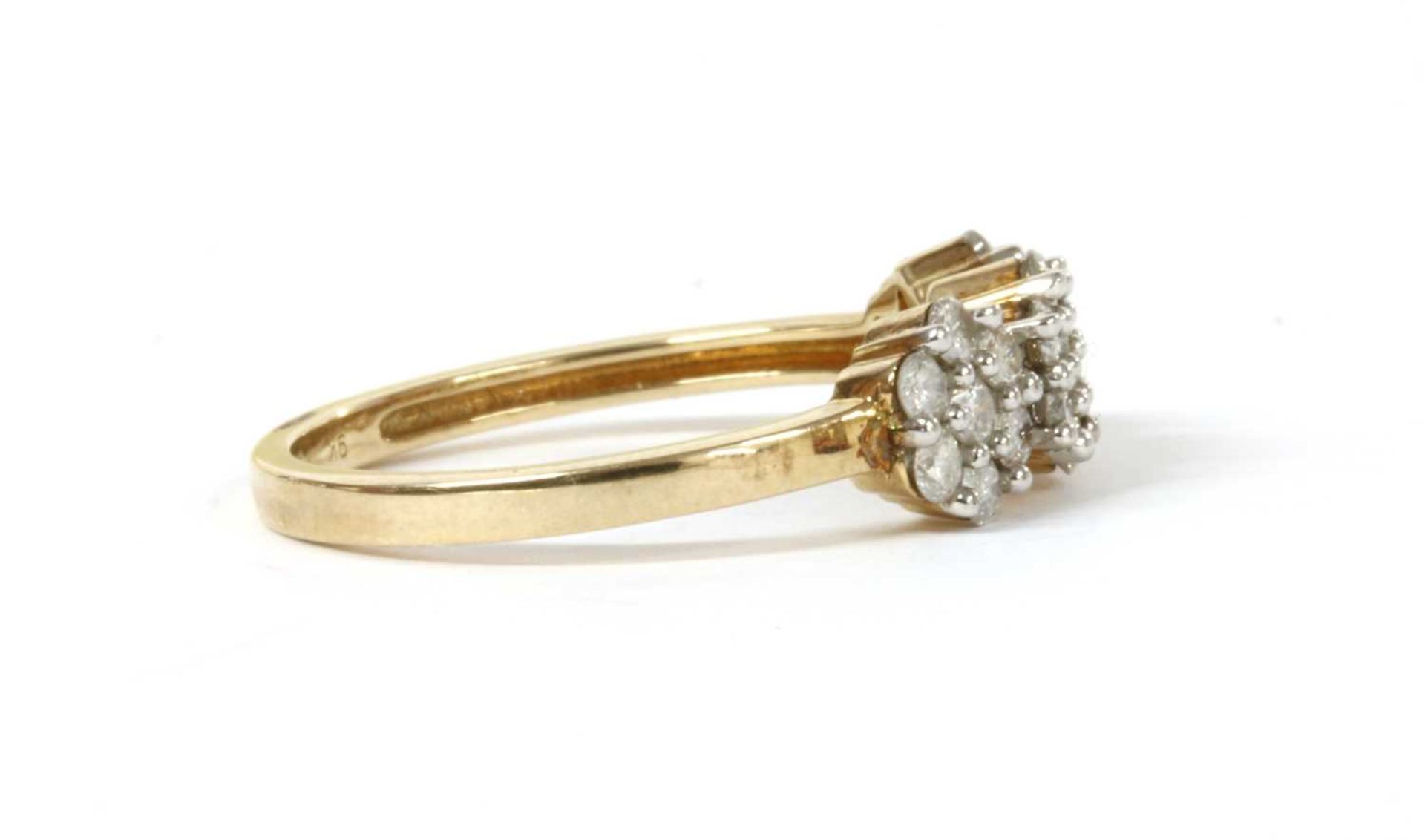 A gold diamond cluster ring. - Image 3 of 3