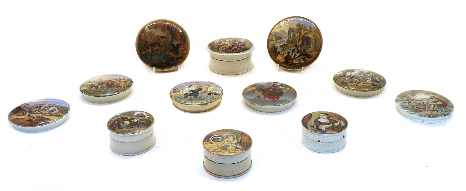 Twelve Victorian coloured pot lids,