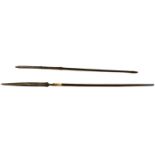 Two early 19th watered steel Malaysian spears,