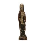 A carved figurine of Saint Elijah,