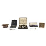 A collection of silver items,