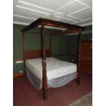 A mahogany four poster bed