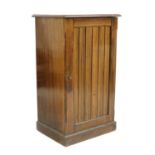 An Edwardian walnut apothecaries cabinet,