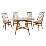 An Ercol 'Windsor' dining table and four 'Goldsmith' chairs,