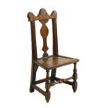 A George III county oak side chair,