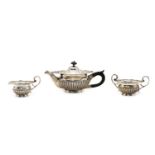 A three piece silver bachelors teaset