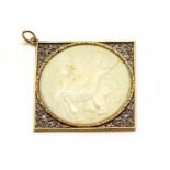 A gold and silver, ivory and diamond cameo pendant,