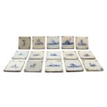 A box of 18th and 19th century Delft tiles,