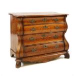 A 19th century Dutch marquetry bombe shaped chest of four drawers,
