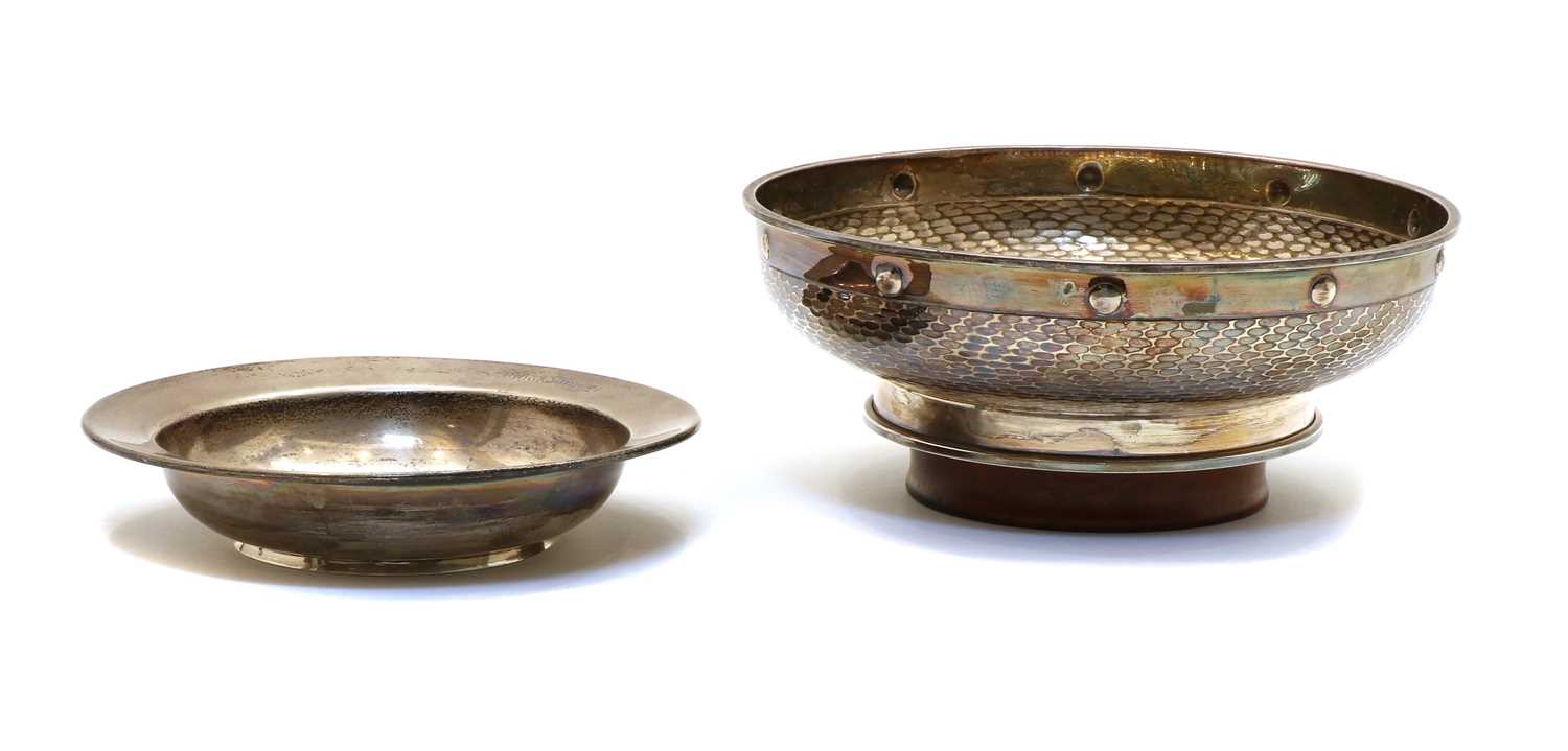 A footed silver bowl,